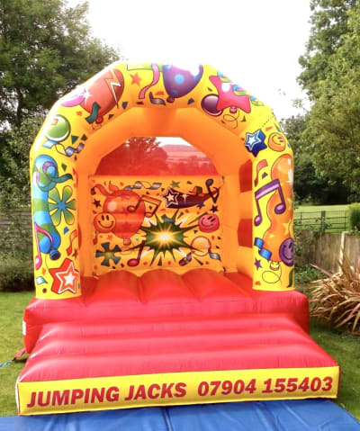 10 X 11 Carnival Theme, a bouncy castle for hire from Jumping Jacks Bouncy Castles
