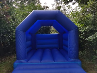 BLUE BOUNCY CASTLE 15FT vs 11ft, a bouncy castle for hire from All Bounce Surrey