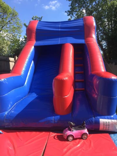 Red and blue slide, a inflatable slide for hire from Bounce About Sussex