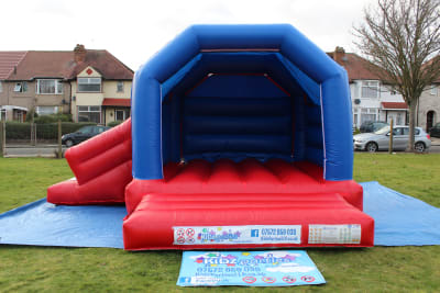 (BC-0) "Plain" Red & Blue Themed Bouncy Castle (Slide), a bounce and slide combo for hire from KiDz Parties LLP