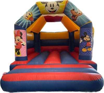 11ft by 15ft Mickey Mouse theme castle, a bouncy castle for hire from Jump Around Bouncy Castles