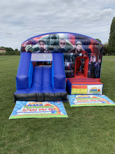 Marvel front slide, a inflatable slide for hire from Let's Make Memories