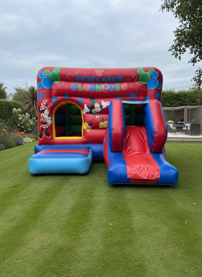 Mickey Mouse bouncy castle slide combo 12x17ft, a bounce and slide combo for hire from The Bounce Boutique