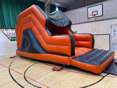 Up and Over Slide 8ft Platform, a inflatable slide for hire from Animal Bouncers