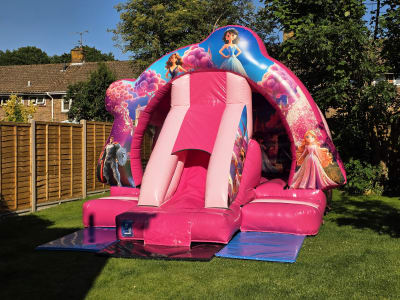 15ft x 12ft Princess Bouncy Castle With Slide, a bounce and slide combo for hire from MLM Bouncy Castles