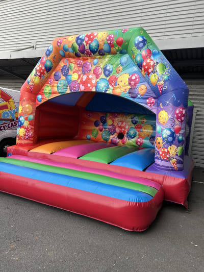 Rainbow Adult Disco Bouncy Castle, a adult bouncy castle for hire from Tilley's Bouncy Castles and Soft Play Hire