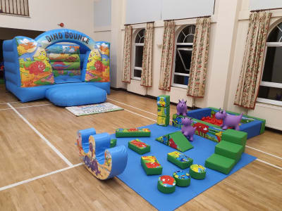 Dinosaur bouncy castle & soft play package, a party package for hire from Allsorts Inflatables