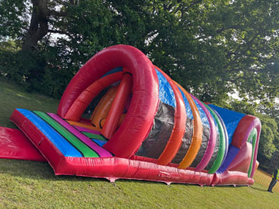 42ft Spiro Run Obstacle Course, a assault course for hire from Bouncing Happy