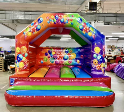 *NEW* Bouncy Castle Party Multicolour, a bouncy castle for hire from Bromley Bouncy Castles