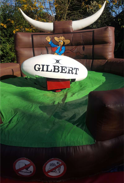 Rodeo Rugby Ball Hire Surrey, a inflatable game for hire from Alpha Bouncy Castles & Events