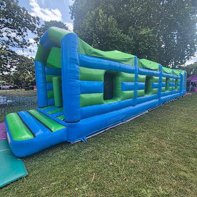 63ft Green & Blue Obstacle Course, a assault course for hire from Every Bounce Counts