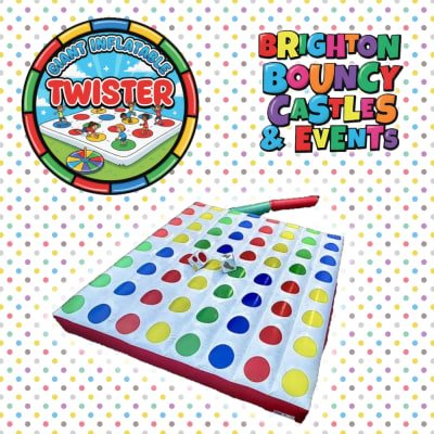 Giant inflatable twister, a inflatable game for hire from Brighton Bouncy Castles