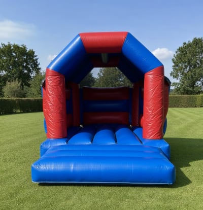 Velcro Red & Blue Castle 11x15ft, a bouncy castle for hire from The Bounce Boutique