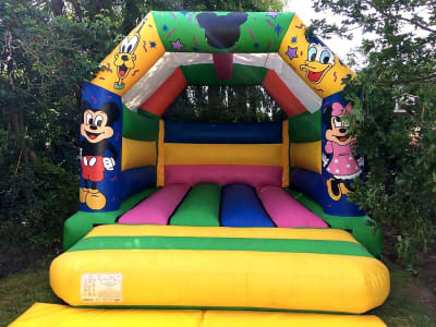 15ft x 12ft Mickey Mouse Bouncy castle ( LARGE ), a bouncy castle for hire from TFG Bouncy Castles