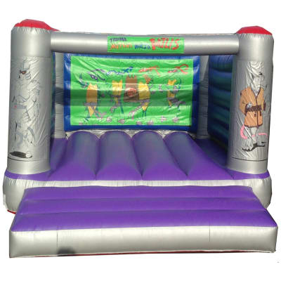 18 Ninja Turtles, a bouncy castle for hire from Jumping Jacks