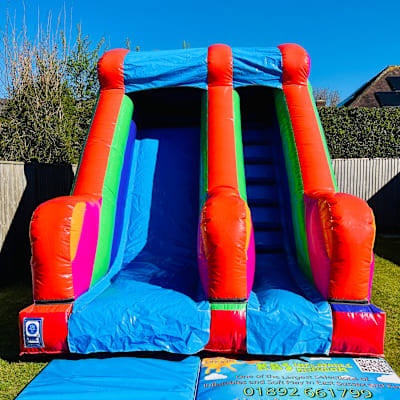 8ft Platform Multi-Coloured Slide, a inflatable slide for hire from KBS Inflatable Kingdom