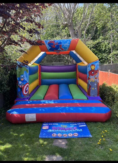 Superhero Bouncy Castle (15ft x 12ft), a bouncy castle for hire from The Bounce Generation
