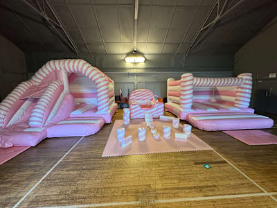 Super White & Pink Candy Cane Package, a party package for hire from Bounce House Inflatables