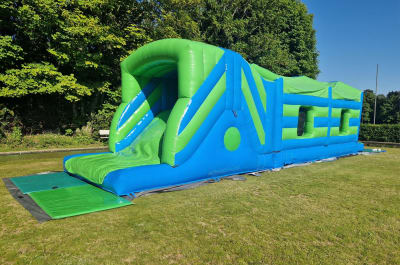 42ft Green & Blue Obstacle Course, a assault course for hire from Every Bounce Counts