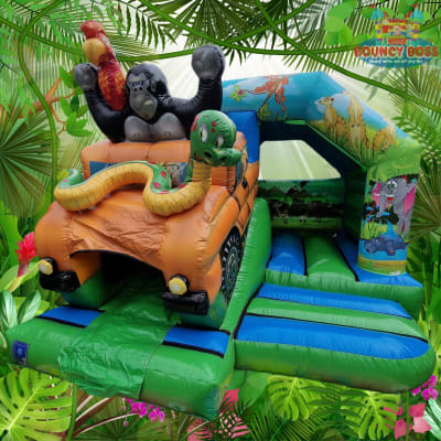 3D jungle safari bouncy castle with slide, a bounce and slide combo for hire from Bouncy Boss