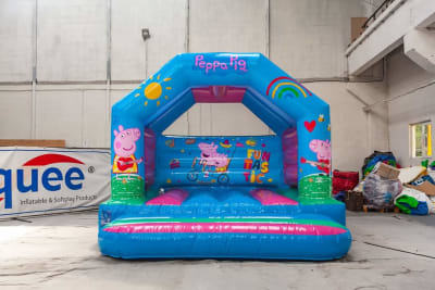 Licensed Peppa Pig bouncy castle 10ft x 12ft, a bouncy castle for hire from Abc Party Hire