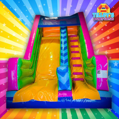 10ft Skittle Drop Slide, a inflatable slide for hire from Tilley's Bouncy Castles and Soft Play Hire