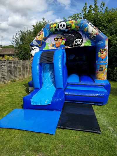 12ft x 18ft Pirate Adventure Bouncy Castle With Slide, a bounce and slide combo for hire from MLM Bouncy Castles