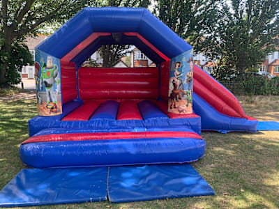 13ft x 18ft Toy Story combo, a bouncy castle for hire from Bounce Mania