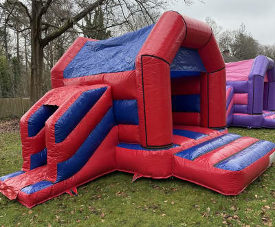 12ft x 15ft Red and Blue with side slide, a inflatable slide for hire from Sploj