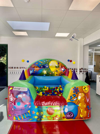 Party Theme Air Juggler Ball Pond, a soft play set for hire from Jumping Jacks Bouncy Castles