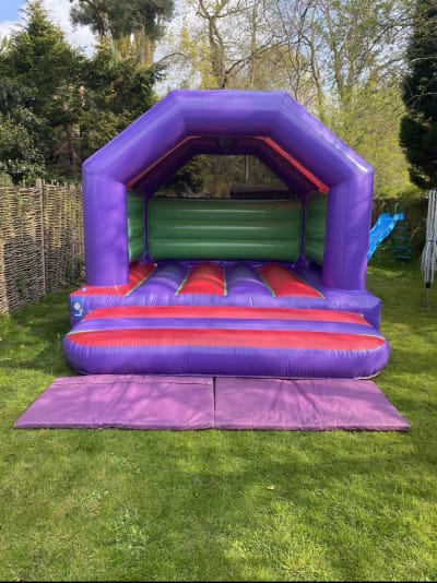 Purple and Green Bouncy Castle, a bouncy castle for hire from Sploj
