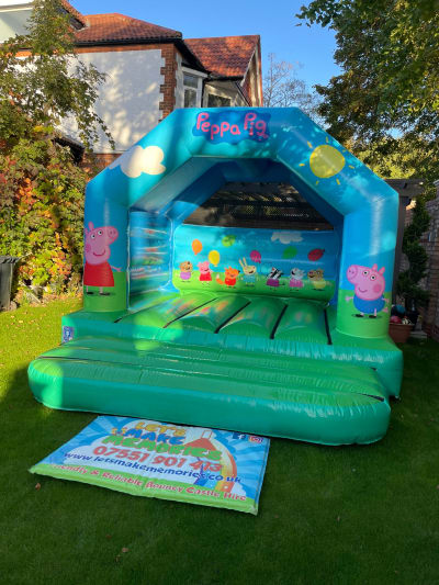 Peppa Pig Bouncy Castle, a bouncy castle for hire from Let's Make Memories