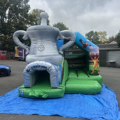 3D Football Bouncy Castle with Slide, a bounce and slide combo for hire from The Bounce Generation