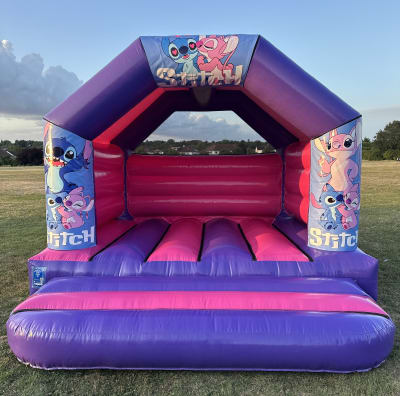 Stitch Bouncy Castle 12x12ft, a bouncy castle for hire from The Bounce Boutique