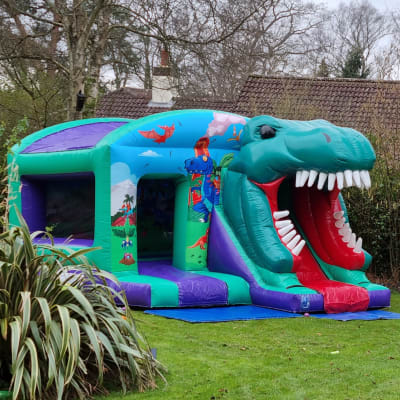 Dinosaur combo 3d, a bouncy castle for hire from Bounce About Sussex