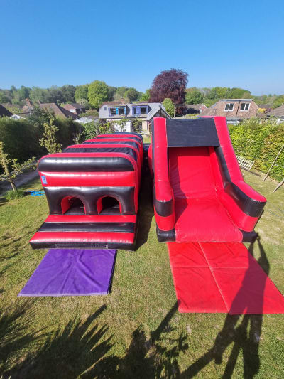 3 part Curved Obstacle, a assault course for hire from Alpha Bouncy Castles & Events