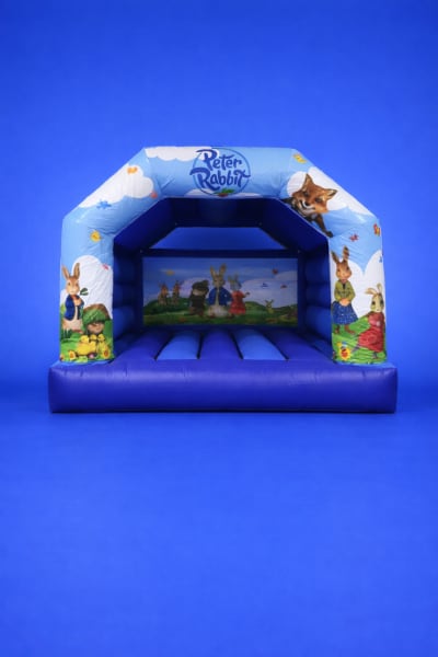 Peter rabbit castle, a bouncy castle for hire from Croydon Bouncy Castles