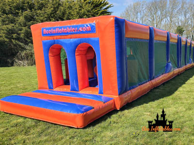 75ft Orange and Blue Inflatable Assault Course, a assault course for hire from Ace Inflatables