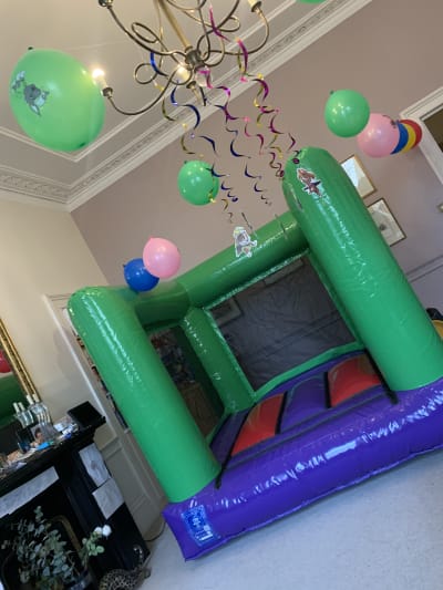 Mini Green Bouncy Castle, a toddler inflatable for hire from Playdays Parties