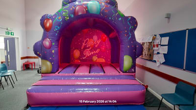 12 x 12 Pink and Purple PartyTime Bouncer, a bouncy castle for hire from TnT PartyTime