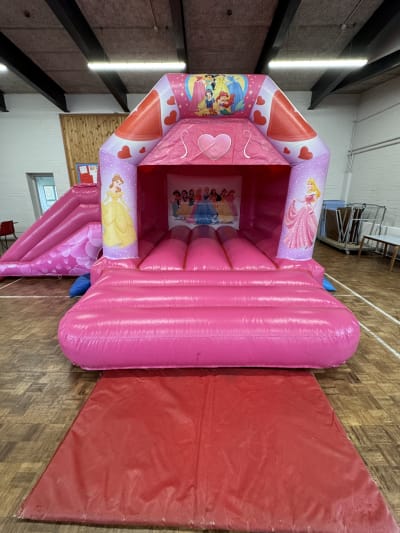 15ft x 18ft Disney Princess Bouncy Castle Slide-2, a bounce and slide combo for hire from Bouncy Castle Factory
