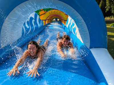 Slip And Slide Water Chute Hire UK, a inflatable slide for hire from Water Slide Hire