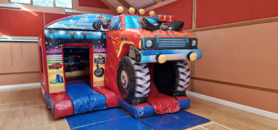 Monster truck, a bouncy castle for hire from Bounce About Sussex