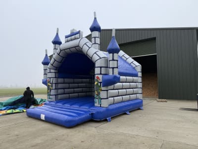 6m x 6m Adult Castle, Blue and Silver, a adult bouncy castle for hire from Sploj