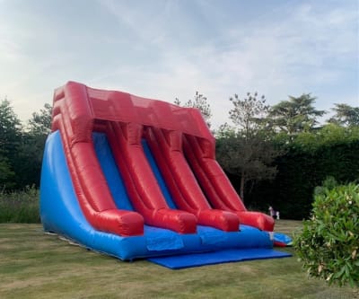 Double 11ft slide, a inflatable slide for hire from Harry's Quads 'N' Castles