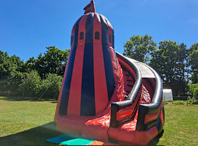 Helter Skelter Slide, a inflatable slide for hire from Laxcorp Event Hire