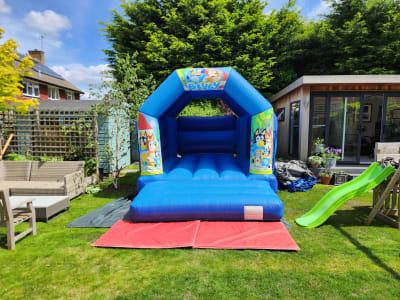 BLUEY BOUNCY CASTLE 15FT vs 11ft, a bouncy castle for hire from All Bounce Surrey