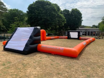Inflatable Football Arena, a inflatable game for hire from Wazoggies Bounce House