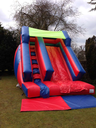 Red & Blue 10ft Platform Slide, a inflatable slide for hire from Wallington Bouncy Castles