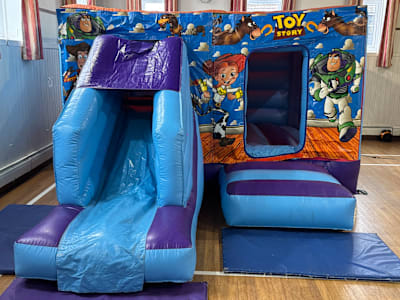 Toy Story Theme (Low height Combi slide Castle ), a bounce and slide combo for hire from Bounce N Fun